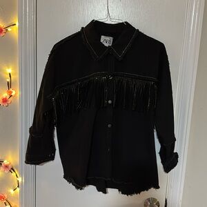 This is a Woman Zara black jacket. As Lots of studs in like new Preloved.